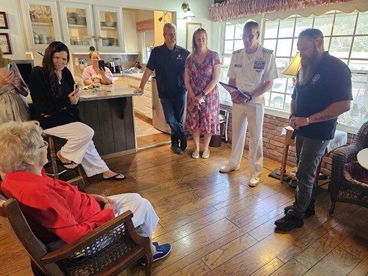 VWC&#39;s Rich Lovelady helps present a Certificate of Honor to Gold Star mother Virgina Kelly.